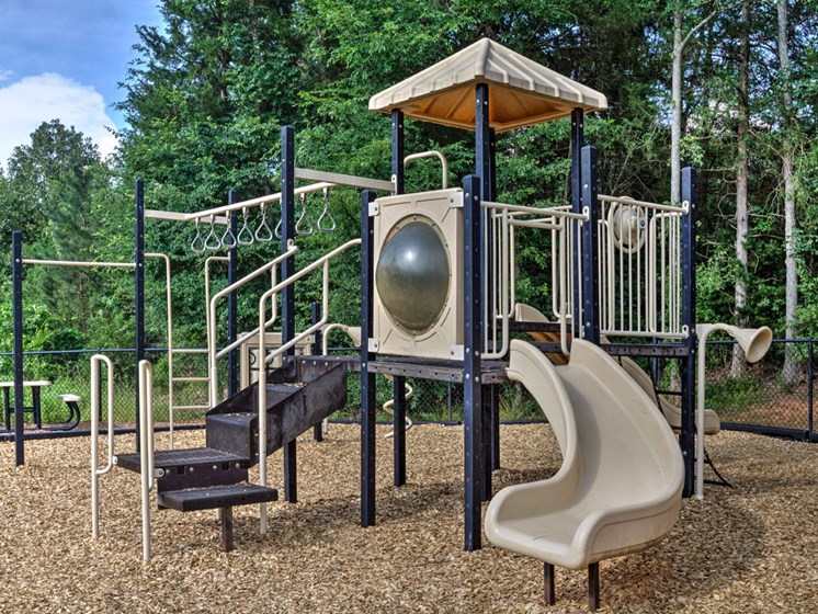 The playground is the perfect spot for some outdoor fun at Abberly Woods Apartment Homes by HHHunt, Charlotte, 28216